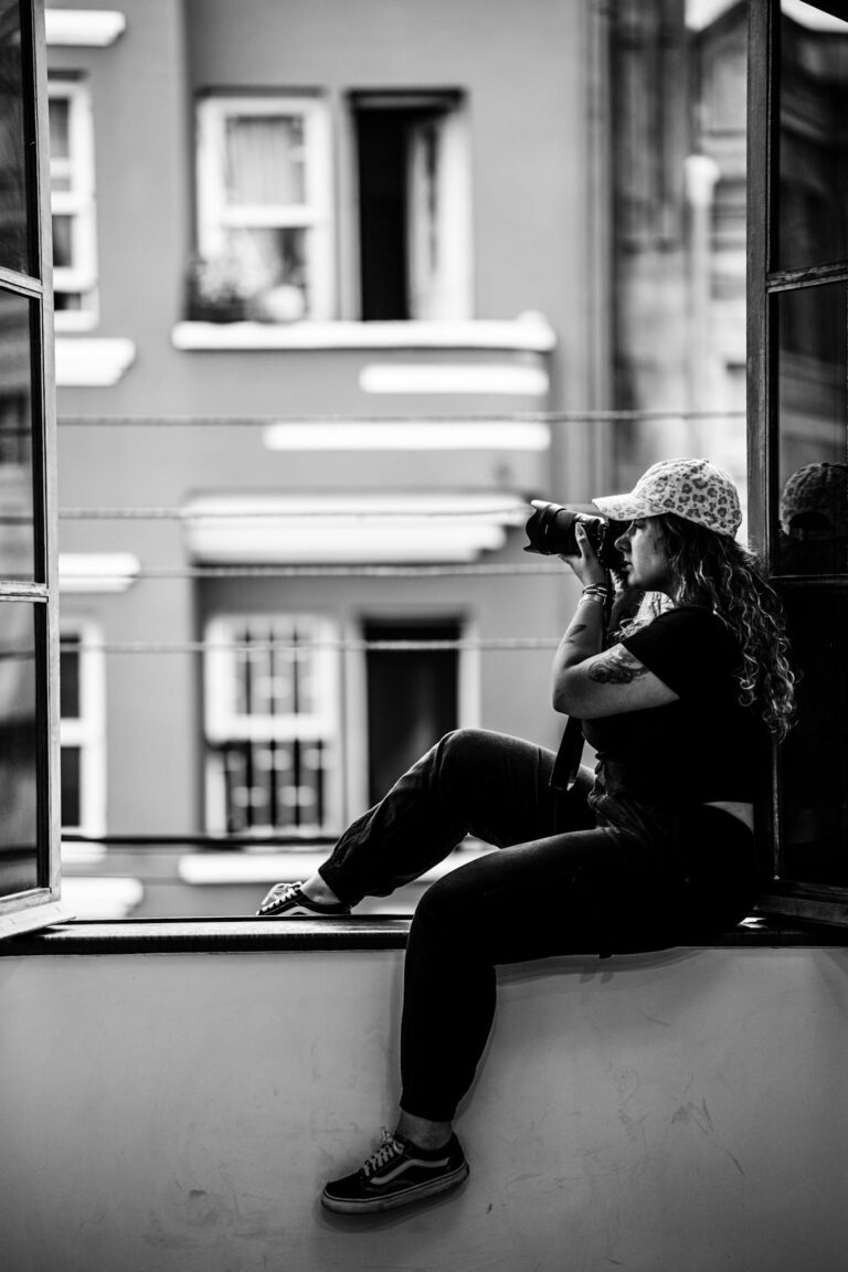 A photographer captures city life from a windowsill in Curitiba, Brazil.